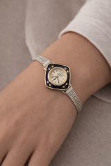 KOMPLE GÜMÜŞ KORDONLU ALTIN MİNELİ KURMALI KADIN KOL SAATİ